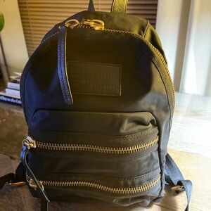 Black Backpack with Gold Accents